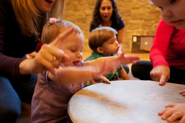 Children play drums. Music helps kids learn numbers.