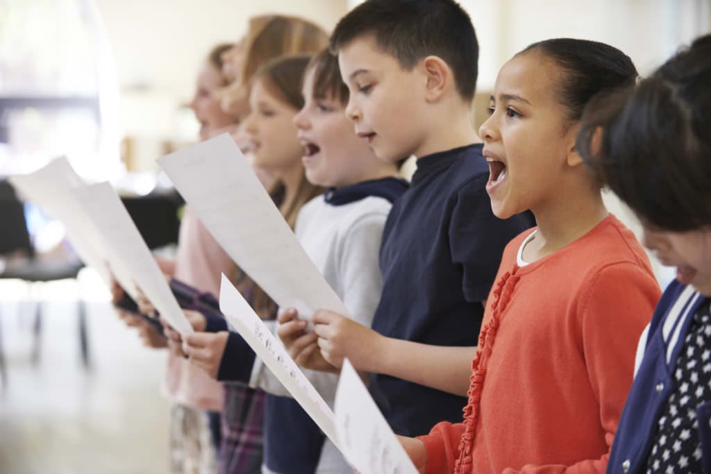image of children signing | voice lessons colorado